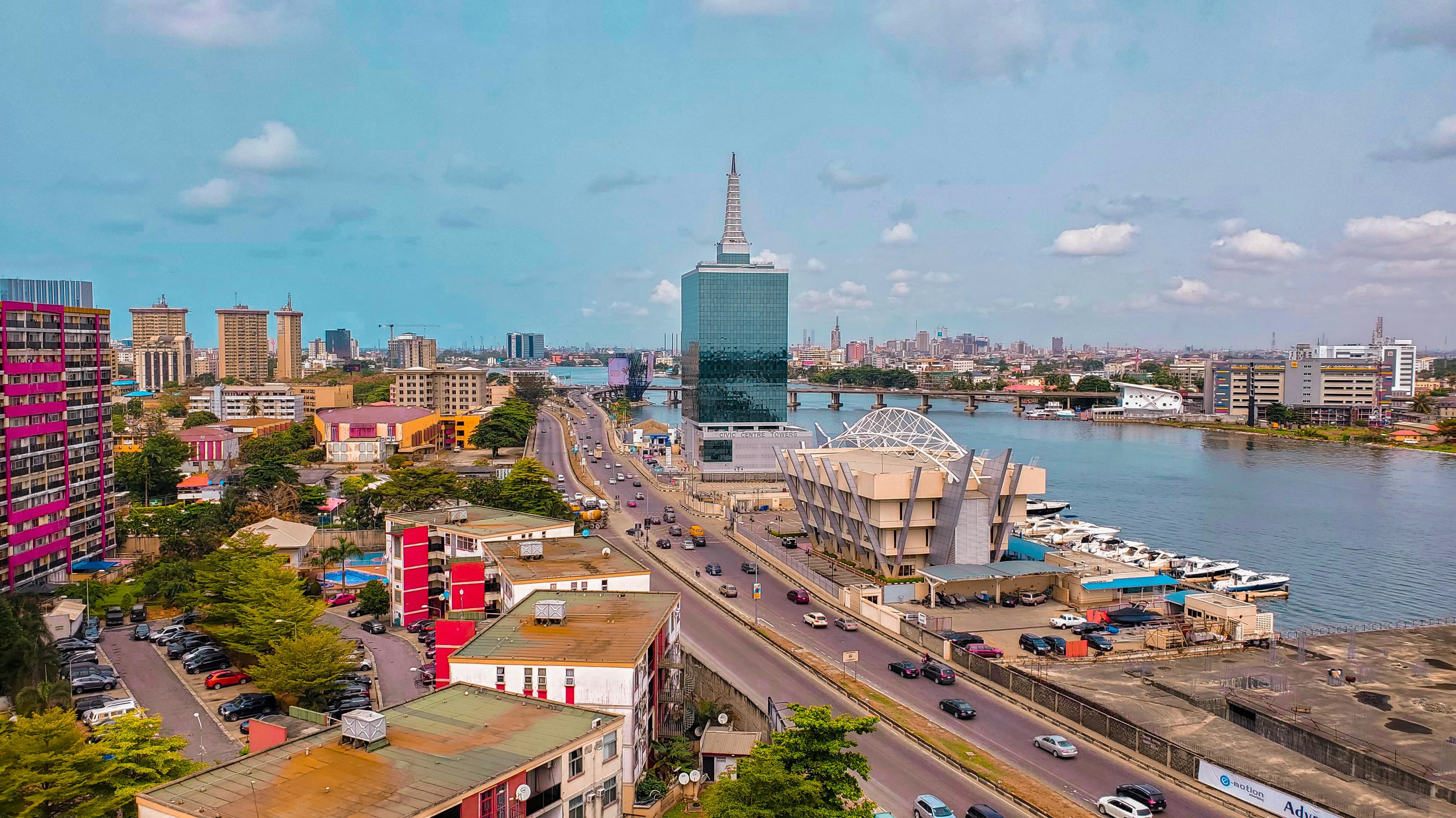 Lagos skyline along the lagoon — the West African coast Livora's recipes are rooted in